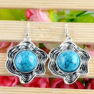 Pretty turquoise flowers with silver tone hardware