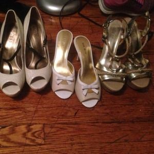 3 pairs of shoes( guess, Nine West , guess)