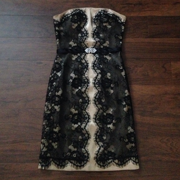 Lace pencil dress with crystal piece