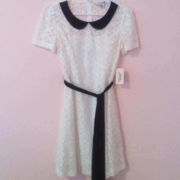 Lace dress with black collar and front tie