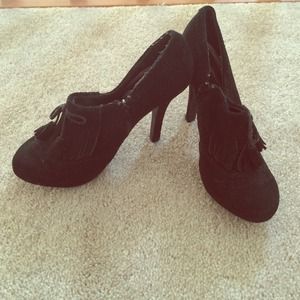 Black motorcycle booties with black accents