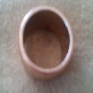 Gold colored barrel ring Size 10 approx