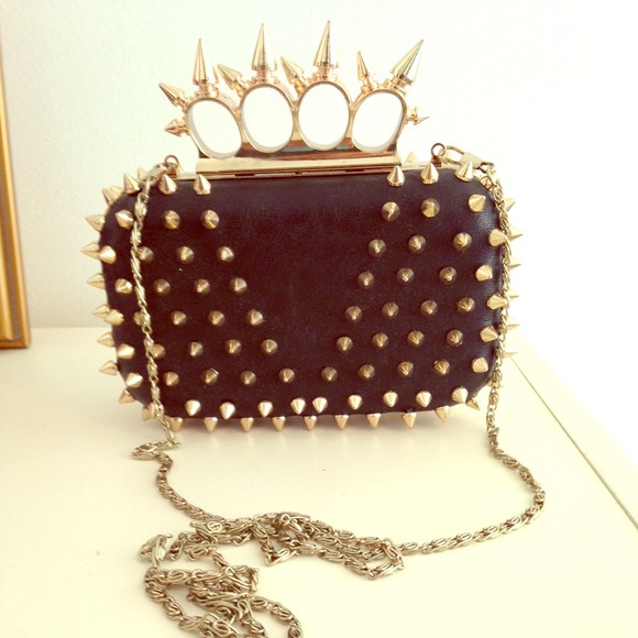 Badass gold spike black clutch