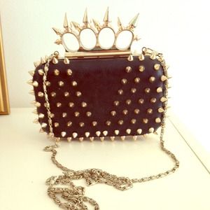 Badass gold spike black clutch