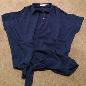 Blue half buttoned up shirt