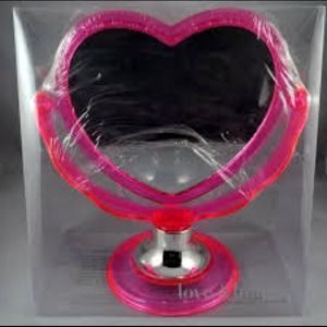LOOKING FOR: forever 21 pink heart shaped mirror