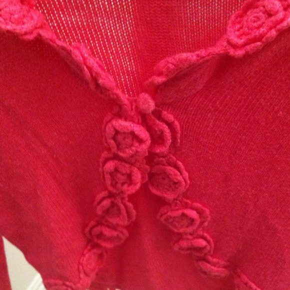 Pink sweater with button enclosure in front. - Picture 2 of 2