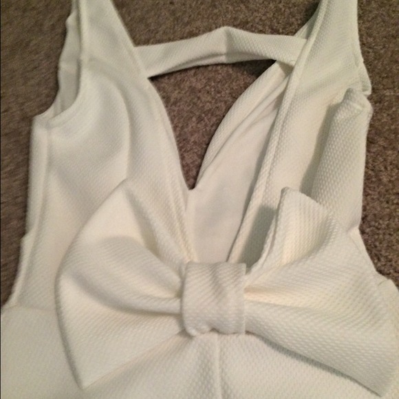 White plunge bow back dress