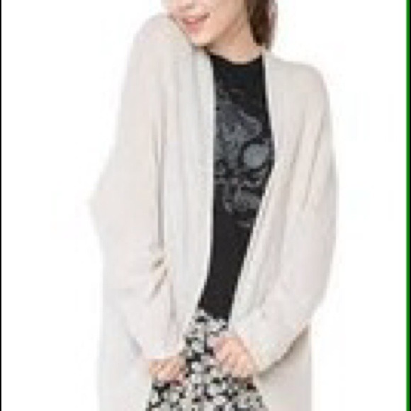 cream colored Caroline cardigan, brandy melville.
