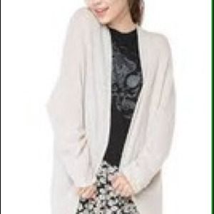 cream colored Caroline cardigan, brandy melville.