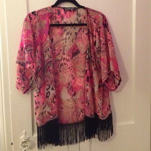 Pink kimono with black fringe