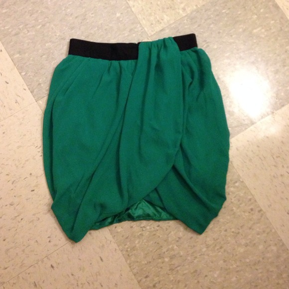 Green draped skirt