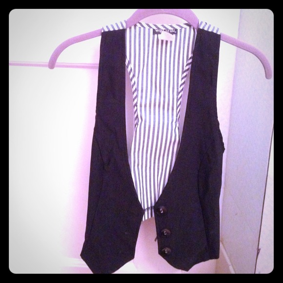 Black vest with a grey and white striped back