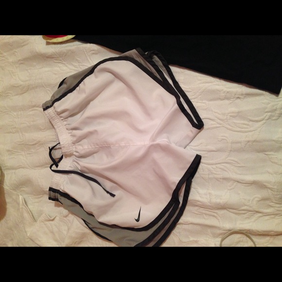 White Nike Dri Fit shorts with black/grey accents