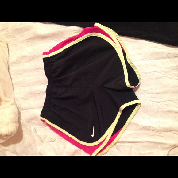 Black Nike Dri Fit shorts with pink/yellow accents