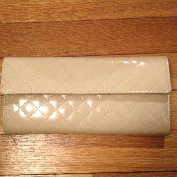 New tags on Aldo Nude patent leather clutch