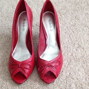 Red leather open toe pumps