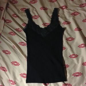 A navy blue Abercrombie lace tank top.