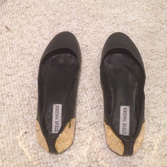 Black leather flats with gold heel
