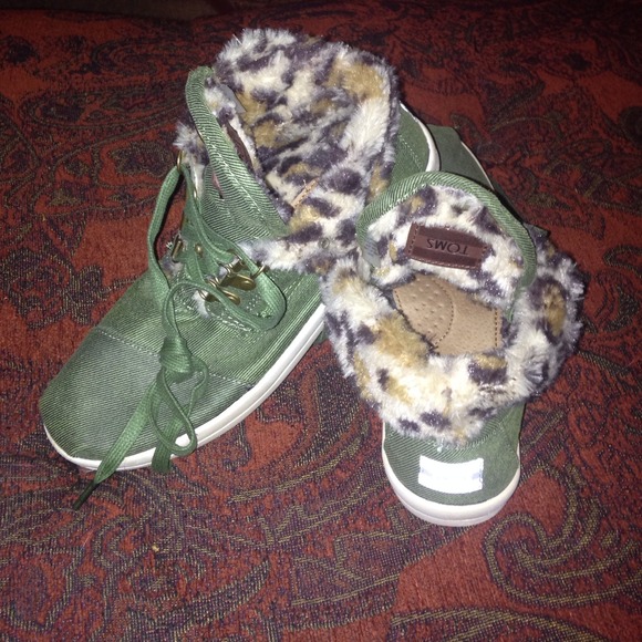 Toms high tops.