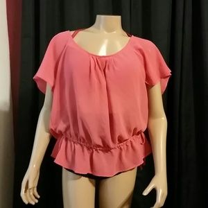 Peplum coral top