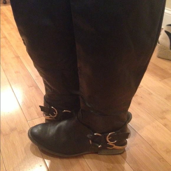 Black faux leather boots with heel buckle