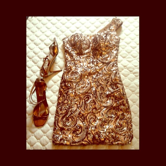 One of a kind, gold with nude and brown details.