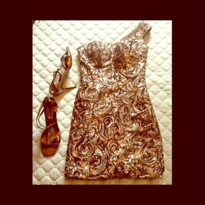 One of a kind, gold with nude and brown details.
