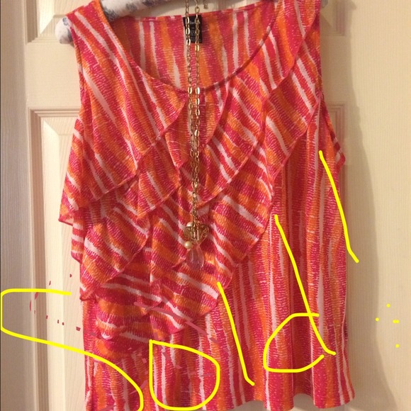 Sleeveless vibrant multi color top!