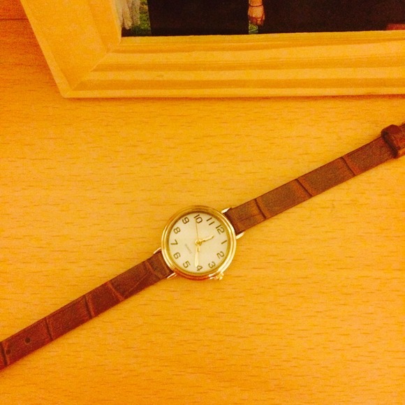 Women brown strap watch