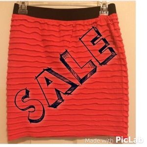 ...NWT mini coral skirt.