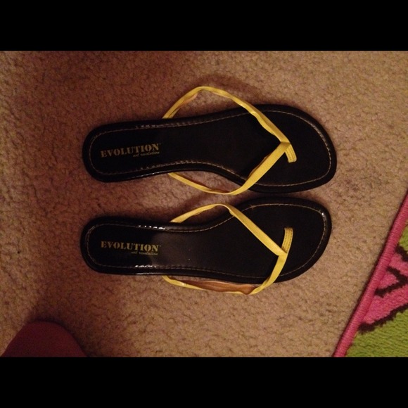 Neon yellow flip flops