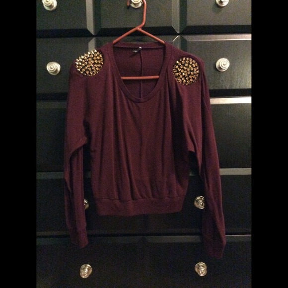 Maroon cropped sweater with gold spiked shoulders