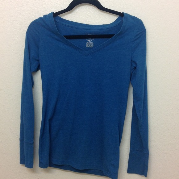 Bright blue long sleeve shirt.