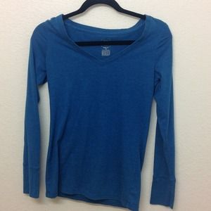 Bright blue long sleeve shirt.