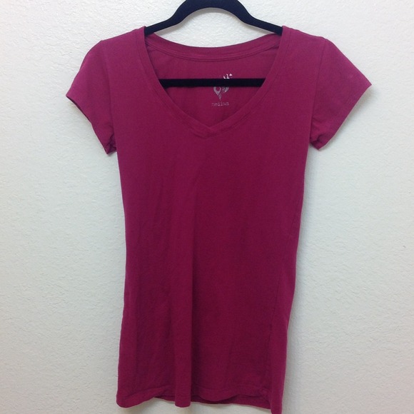 Fuchsia V-neck shirt.