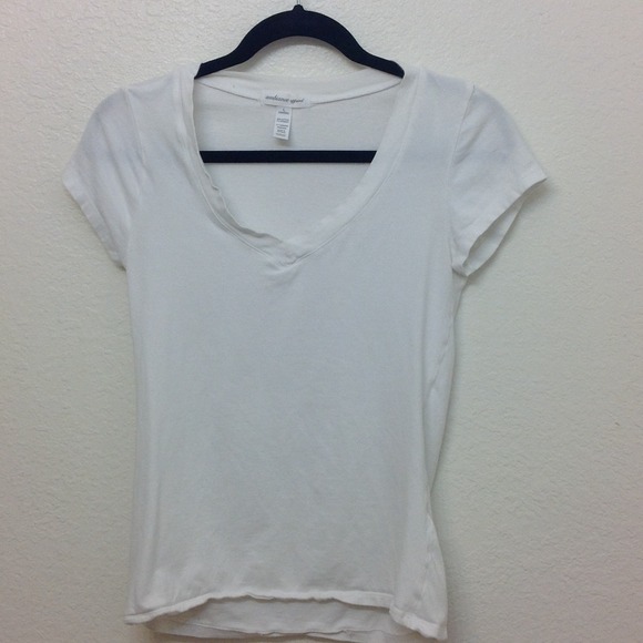 White V-neck shirt.