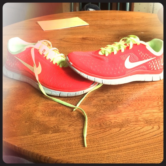 Neon orange and green nike tennis shoes