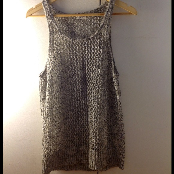 Delicate grey color fishnet like top.