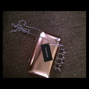 Bebe spiked knuckle clutch