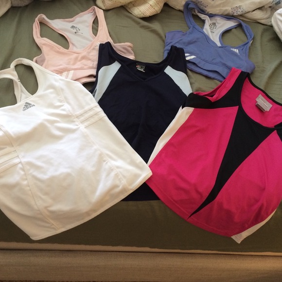 Assortment of designer workout tops