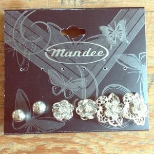 Three pairs of silver earrings