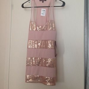 Brand new rose pink sequin tunic.