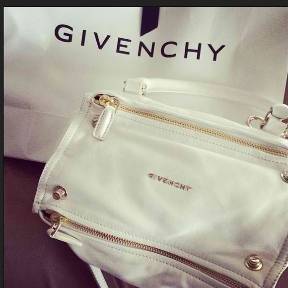 Gorgeous ivory purse by: Givenchy