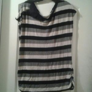 Cato's top with black flower detail on top.