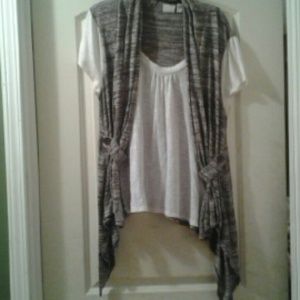 White shirt that has an attached vest.