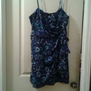 Blue floral dress with bow on the side.