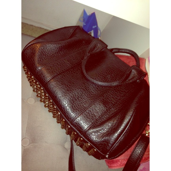 Pebbled stone studded duffel bag