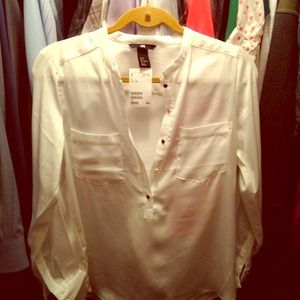 White H&M blouse with gold colored buttons.
