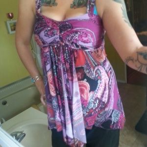 Multicolored paisley print sleeveless blouse.